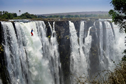 Slack line crossing at Victoria Falls in Zimbabwe